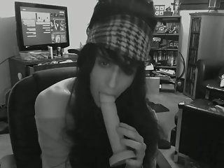 Crossdresser sucking dildo