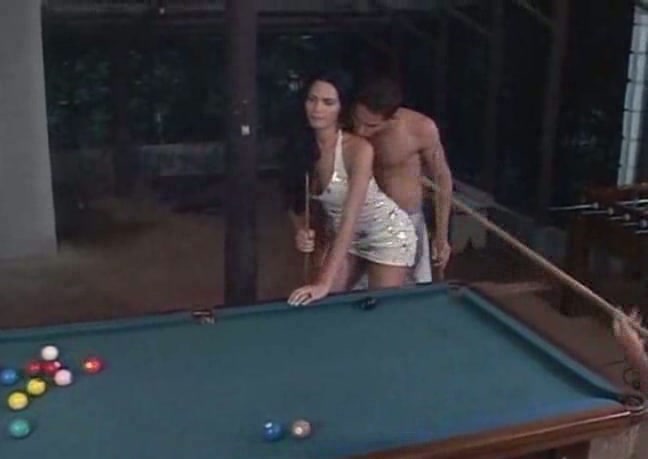 Two guys and brunette shemale drilling on billiards table